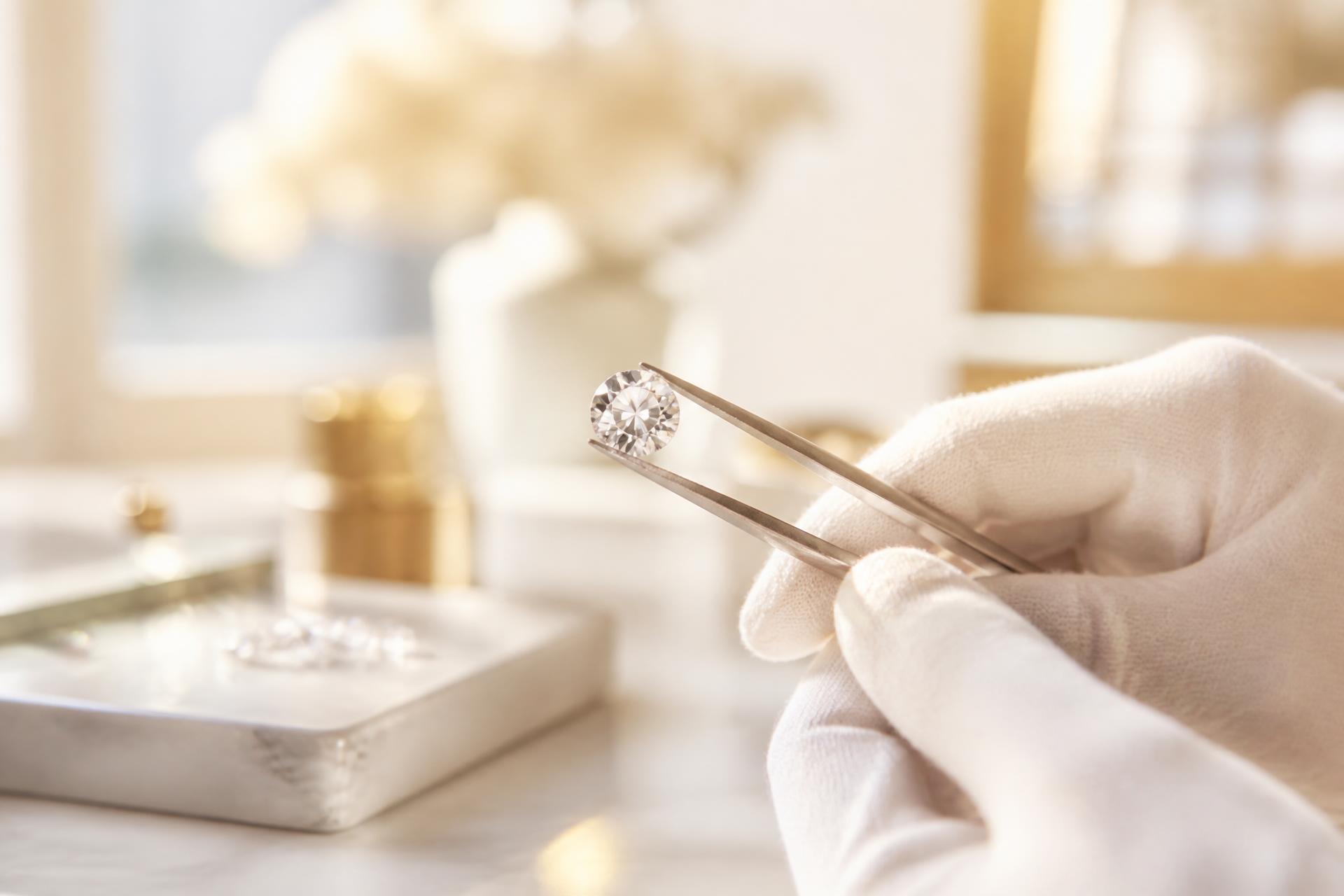 Master diamond craftsmen at work in a luxury manufacturing atelier